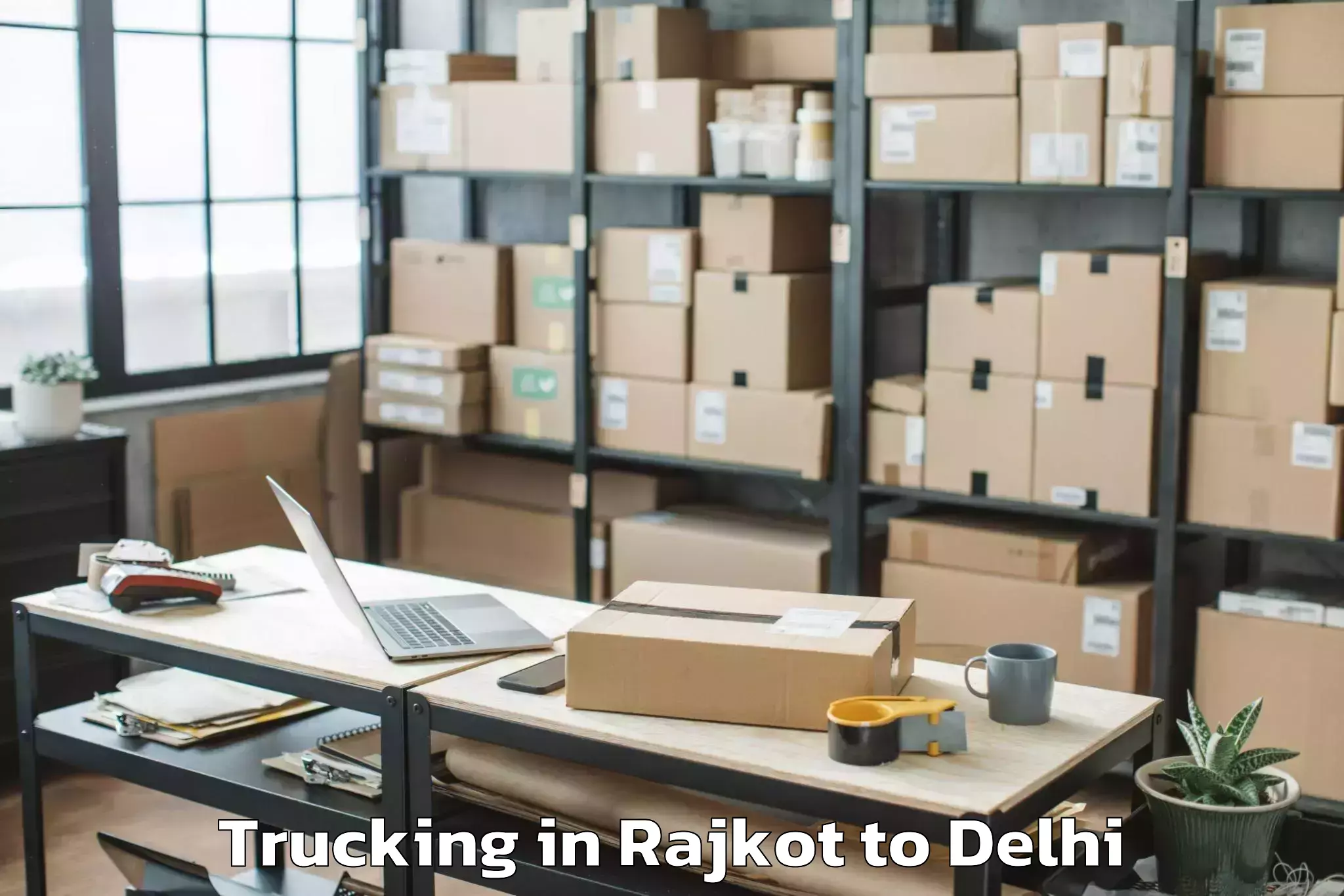 Rajkot to Dlf Promenade Mall Trucking